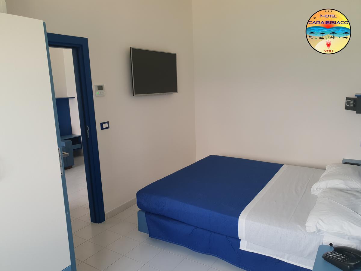 Hotel Caraibisiaco Sul Mare San Pietro in Bevagna Bagian luar foto