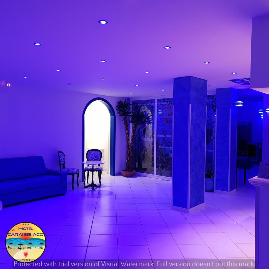 Hotel Caraibisiaco Sul Mare San Pietro in Bevagna Bagian luar foto